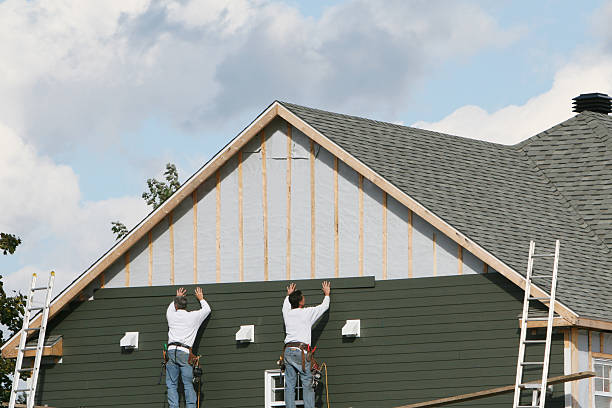 Professional Vinyl Siding technician working in Revere, MA